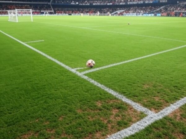 Estádio de futebol no interior de SP com bola no gol, representando empate no Paulistão A2 entre Inter de Limeira e Taubaté.