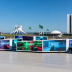 Pavilhão do TecnoGame 2026 em Brasília com estandes de inovação geek e tecnologia.